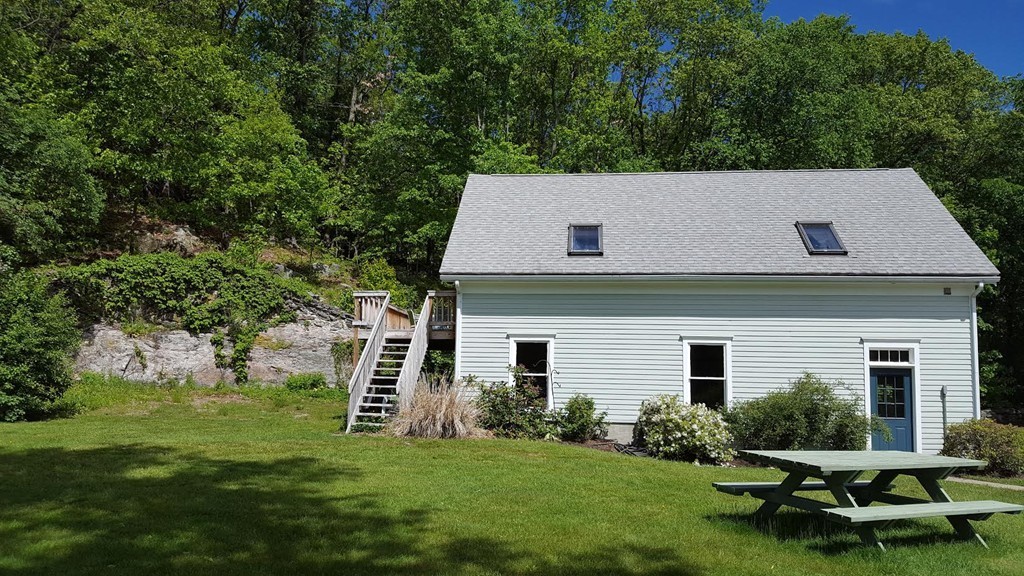 76 Randall Road Berlin, MA 01503 - Photo 27 of 29 a view of a house with a yard