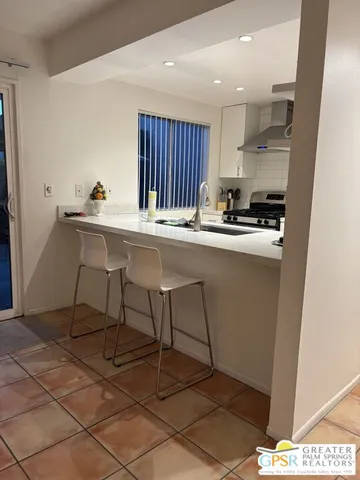 a room with stairs and a table