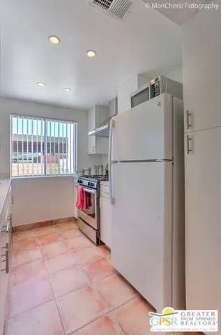 a view of a workspace with furniture