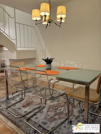 a kitchen with a refrigerator and a sink