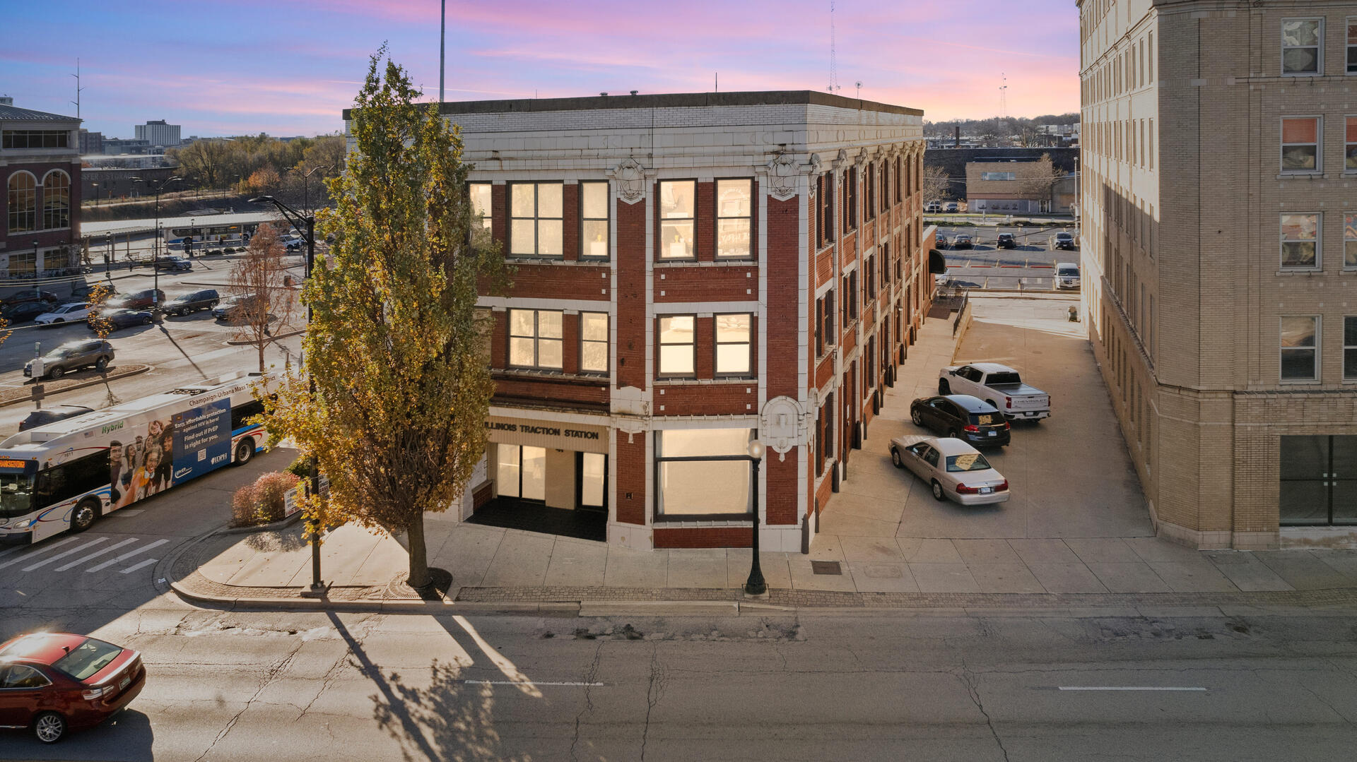 41 East University Avenue Champaign, IL 61820 - Photo 1 of 83 a view of a brick house with many windows