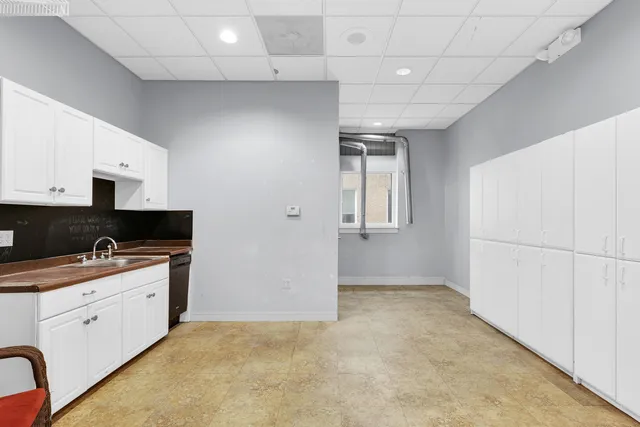 a view of a building with a street