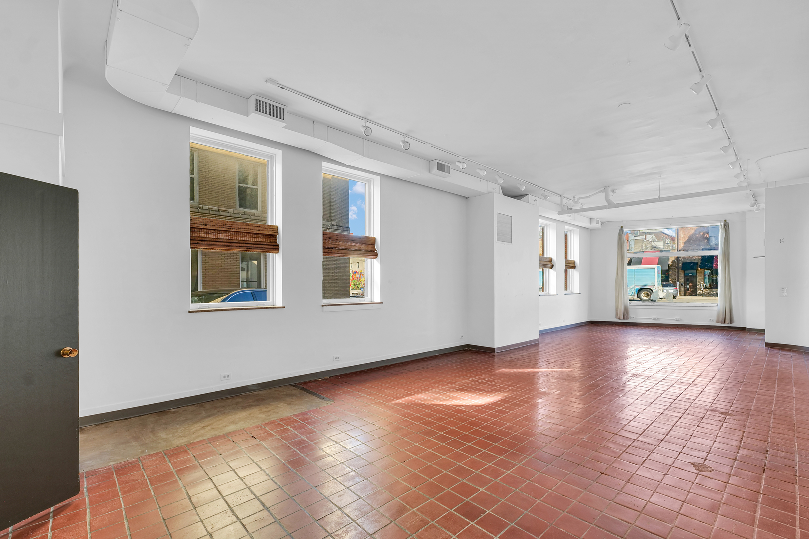 41 East University Avenue Champaign, IL 61820 - Photo 21 of 83 a view of livingroom with hardwood floor and window