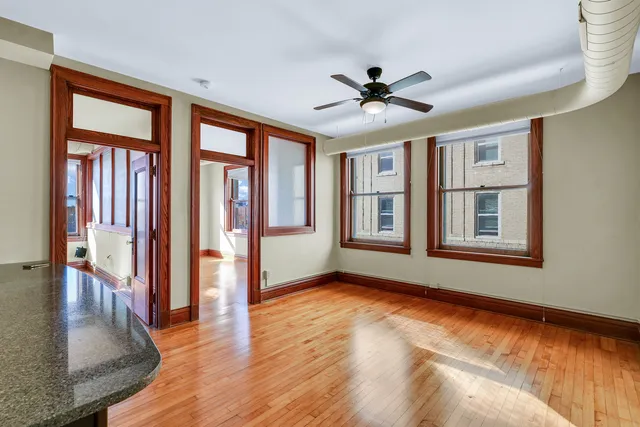 a bathroom with a shower and a toilet