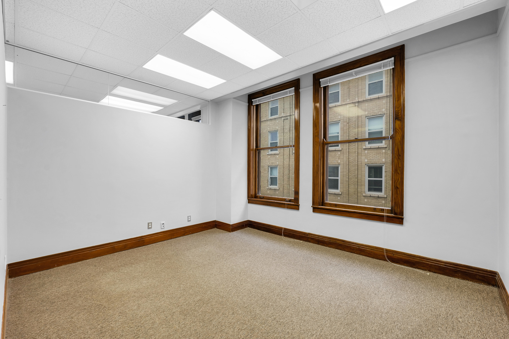 41 East University Avenue Champaign, IL 61820 - Photo 52 of 83 an empty room with windows