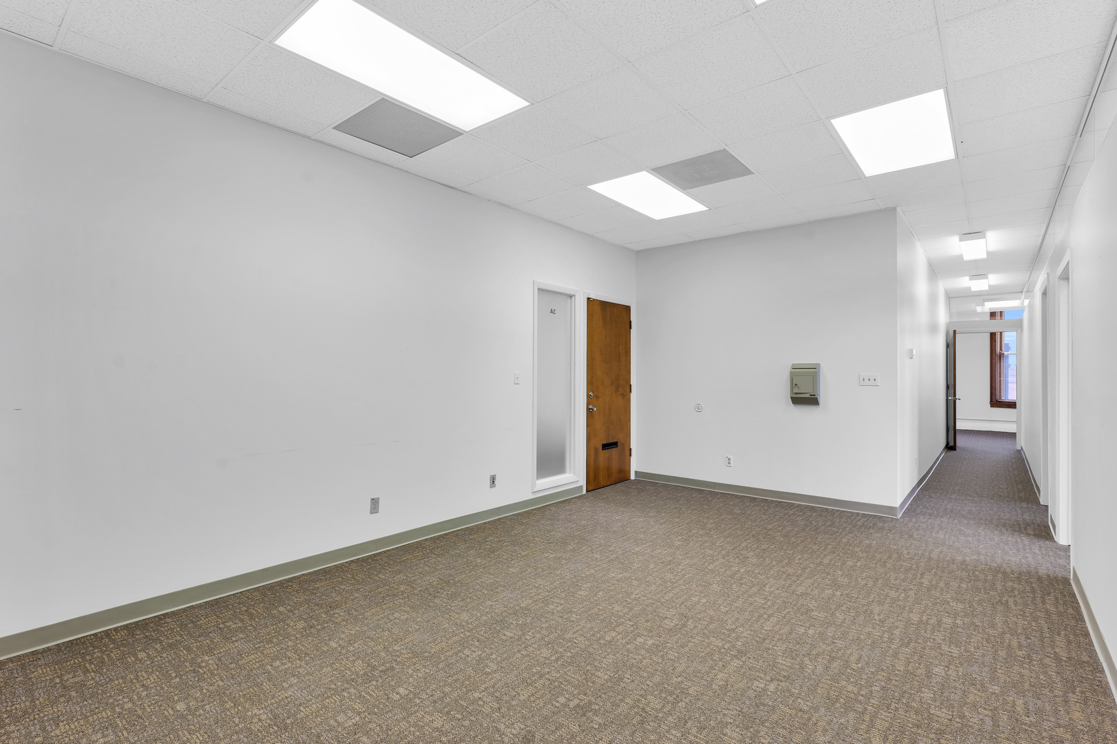 41 East University Avenue Champaign, IL 61820 - Photo 53 of 83 an empty room with a empty space and windows