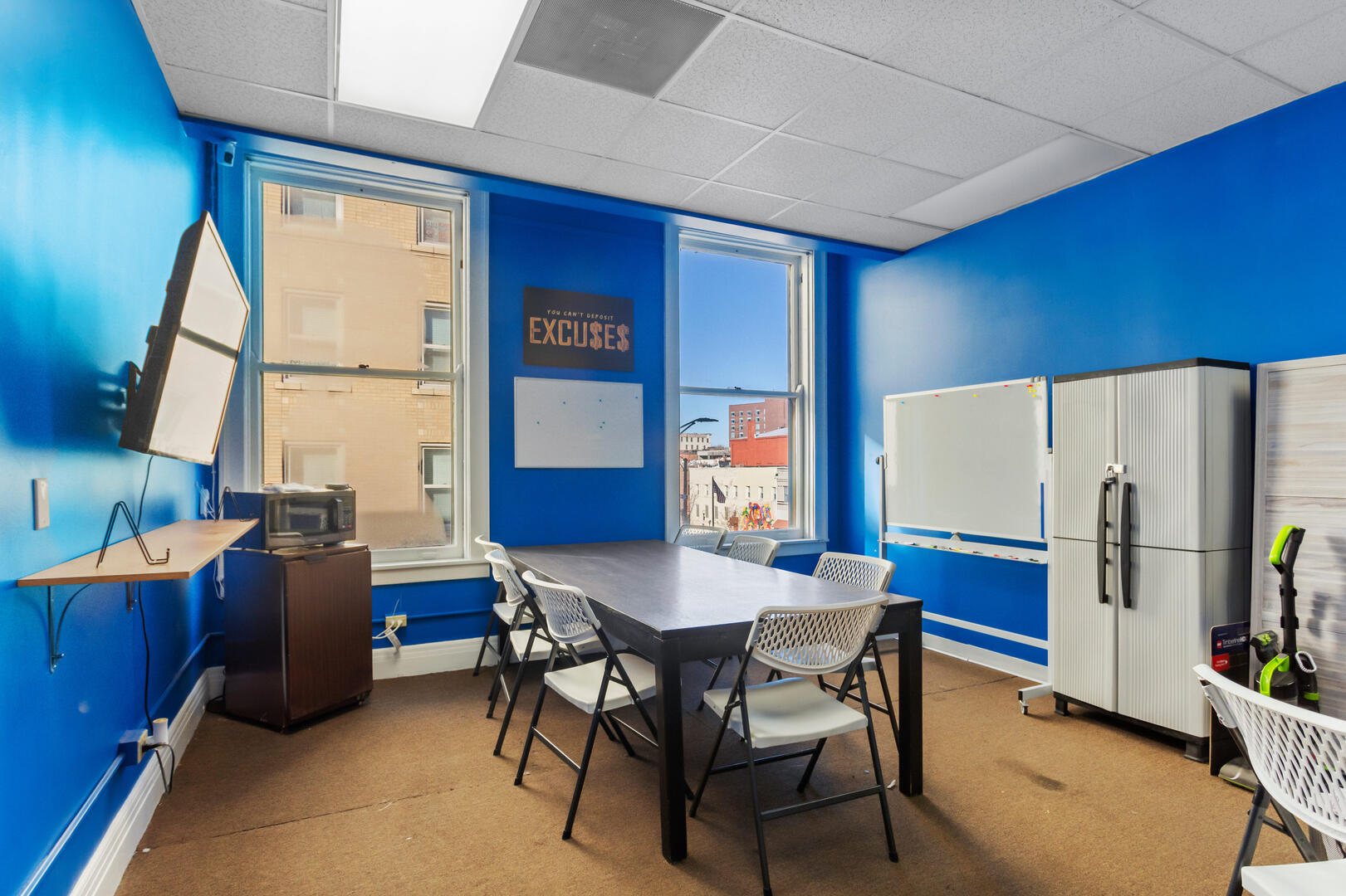 41 East University Avenue Champaign, IL 61820 - Photo 62 of 83 a view of a dining room with furniture and a window