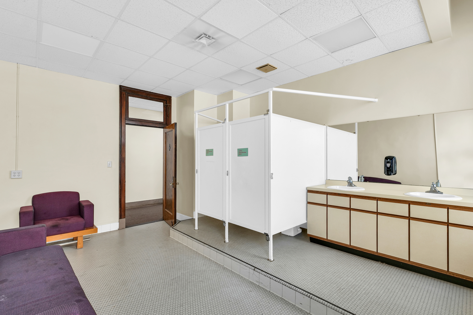 41 East University Avenue Champaign, IL 61820 - Photo 65 of 83 a spacious bedroom with a bed and a dresser