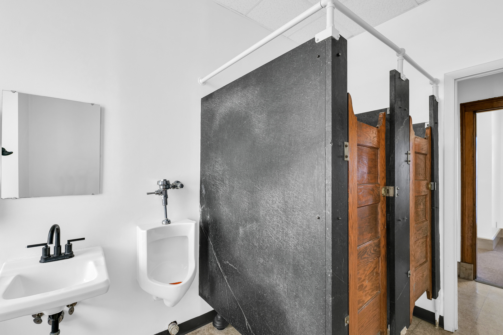 41 East University Avenue Champaign, IL 61820 - Photo 67 of 83 a bathroom with a sink and mirror