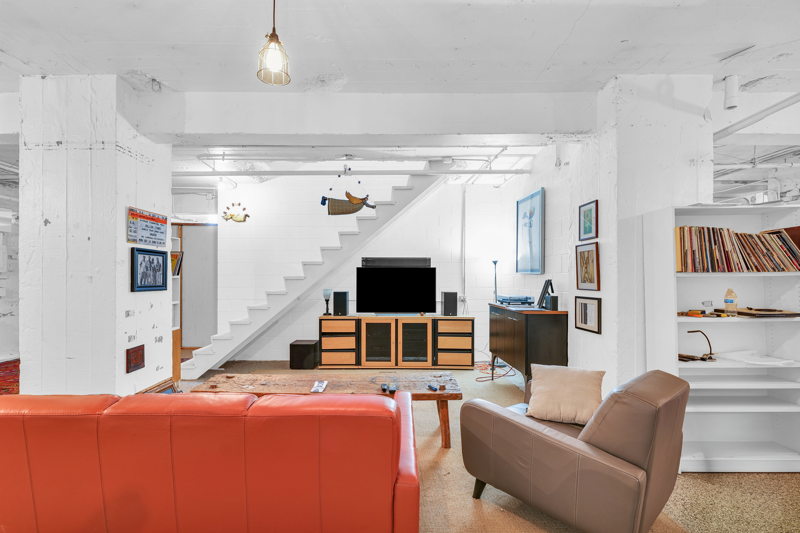 41 East University Avenue Champaign, IL 61820 - Photo 70 of 83 a living room with furniture and a flat screen tv