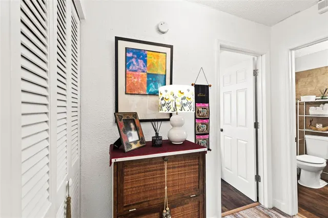 a view of a hallway with workspace