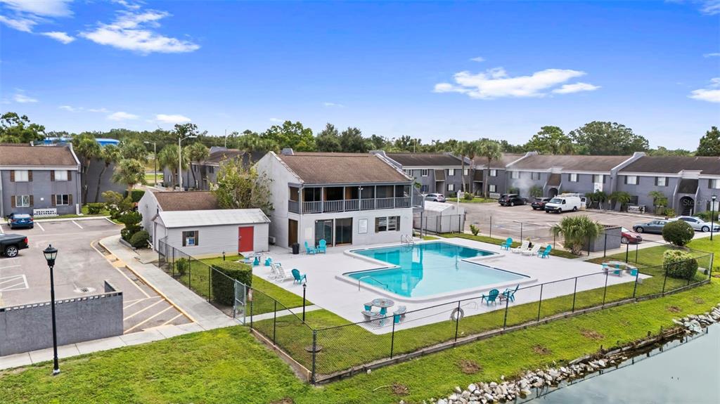 3802 Cortez Circle, Unit C Tampa, FL 33614 - Photo 20 of 24 an aerial view of a house with swimming pool garden and patio