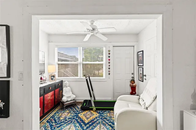 a room with furniture and a window