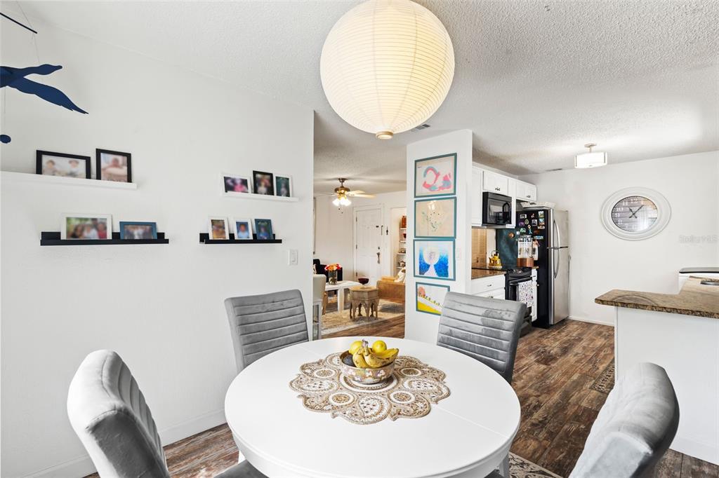 3802 Cortez Circle, Unit C Tampa, FL 33614 - Photo 8 of 24 a living room with furniture and a table