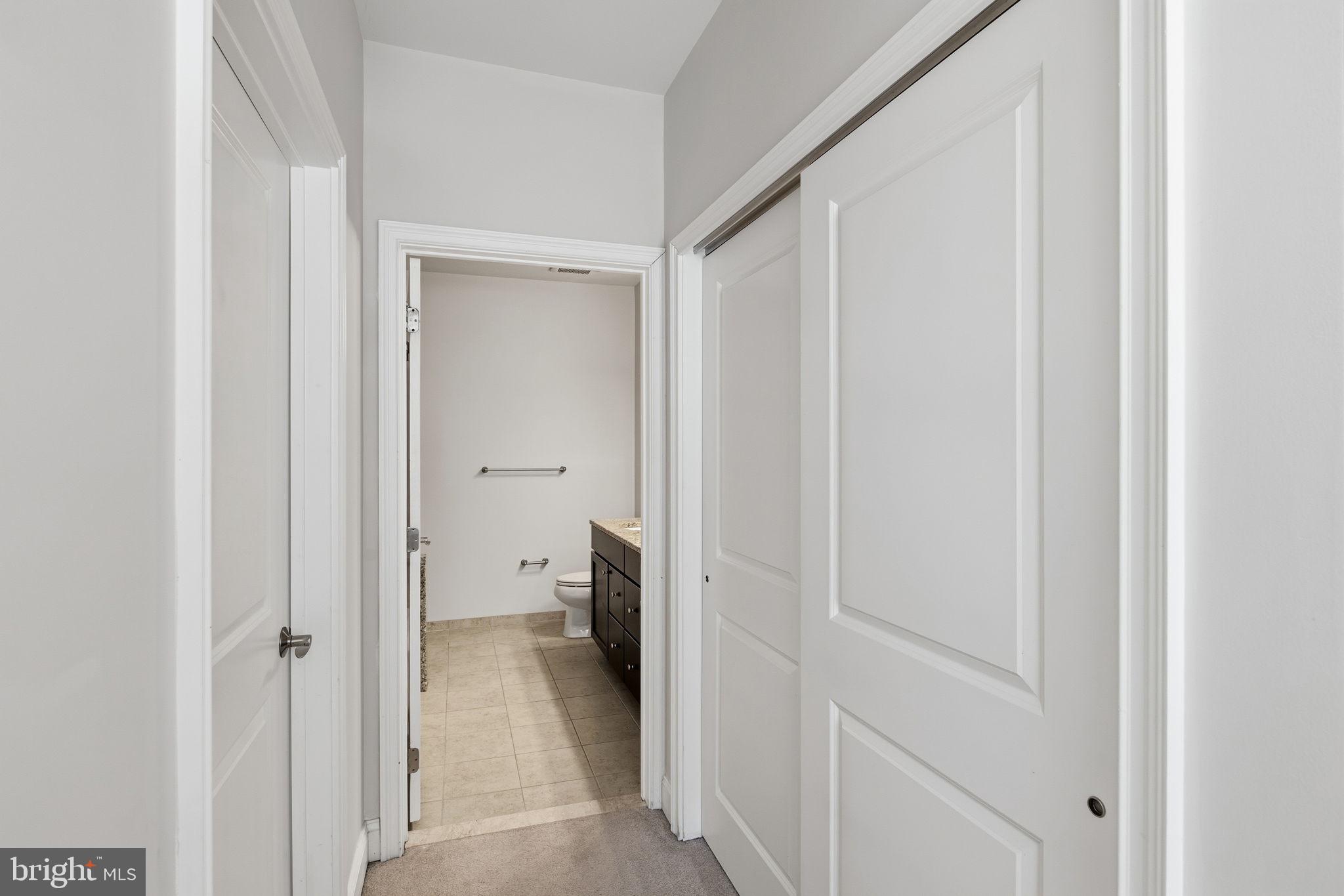 600 Commodore Court, Unit 2604 Philadelphia, PA 19146 - Photo 16 of 33 a view of a bathroom from a hallway