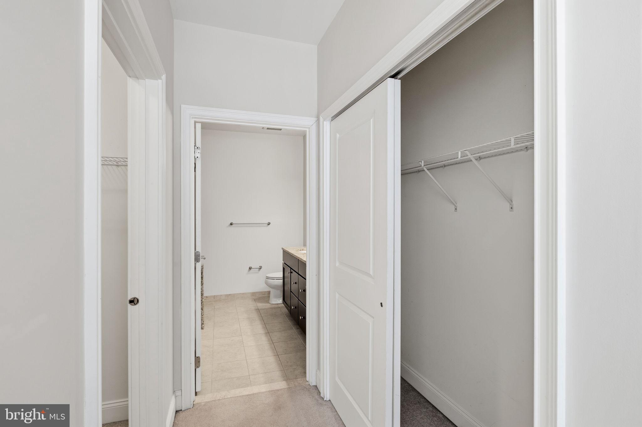 600 Commodore Court, Unit 2604 Philadelphia, PA 19146 - Photo 17 of 33 a view of a bathroom from a hallway