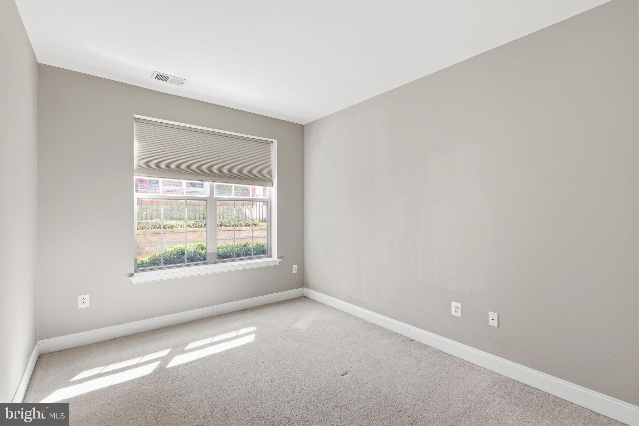 600 Commodore Court, Unit 2604 Philadelphia, PA 19146 - Photo 21 of 33 an empty room with a window