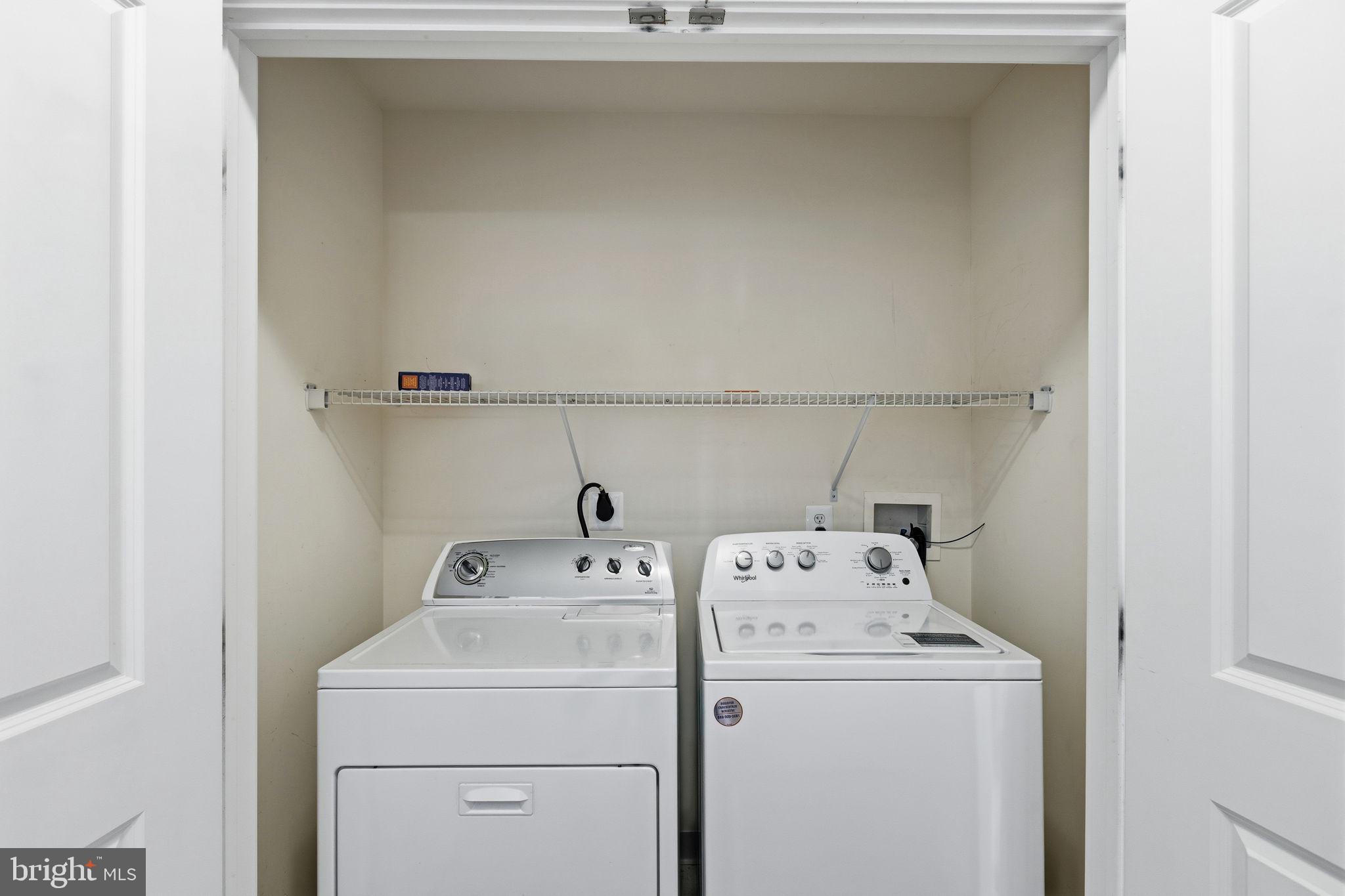 600 Commodore Court, Unit 2604 Philadelphia, PA 19146 - Photo 23 of 33 a utility room with dryer and washer