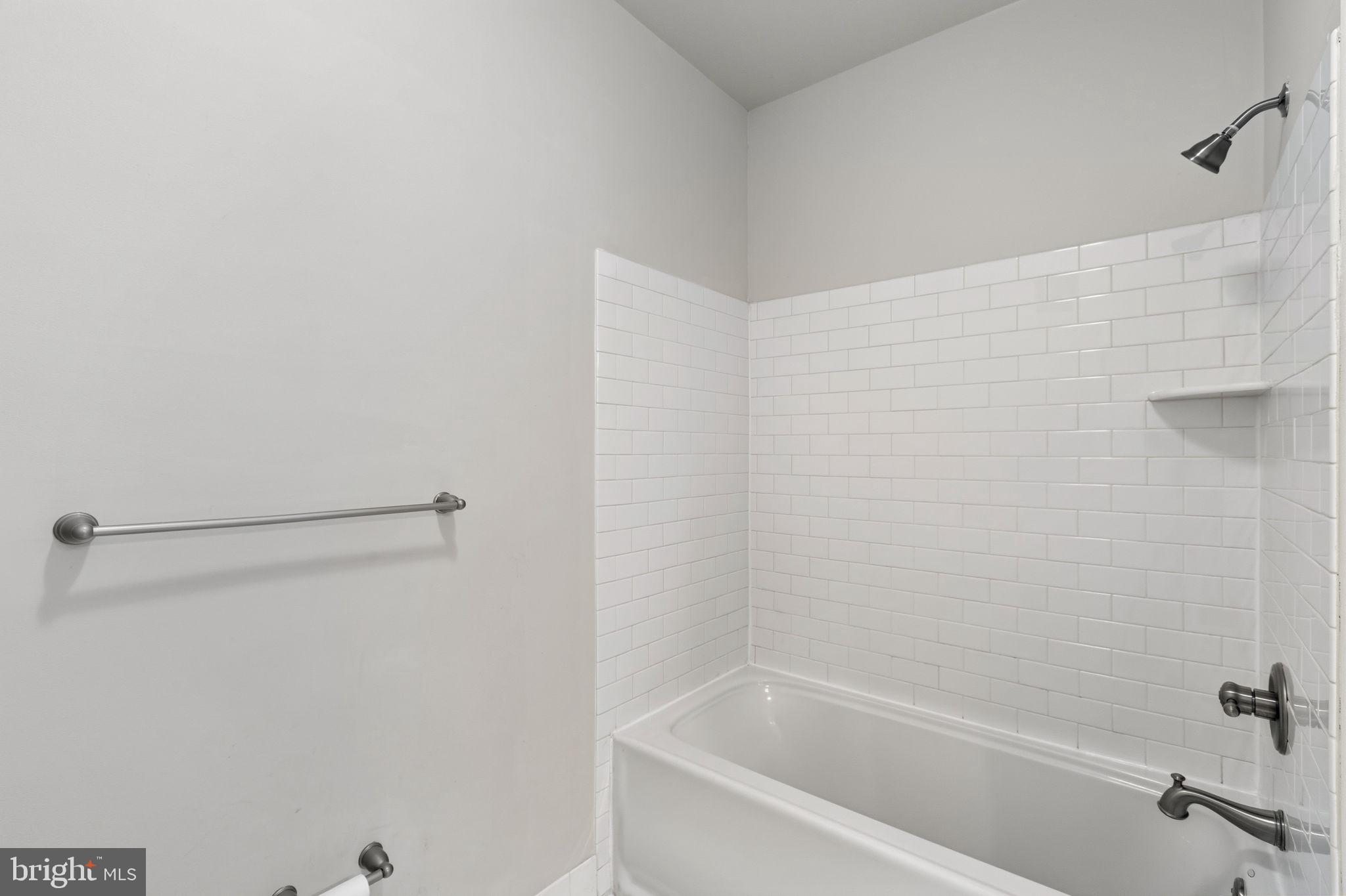 600 Commodore Court, Unit 2604 Philadelphia, PA 19146 - Photo 24 of 33 a close up of a bathtub curtain