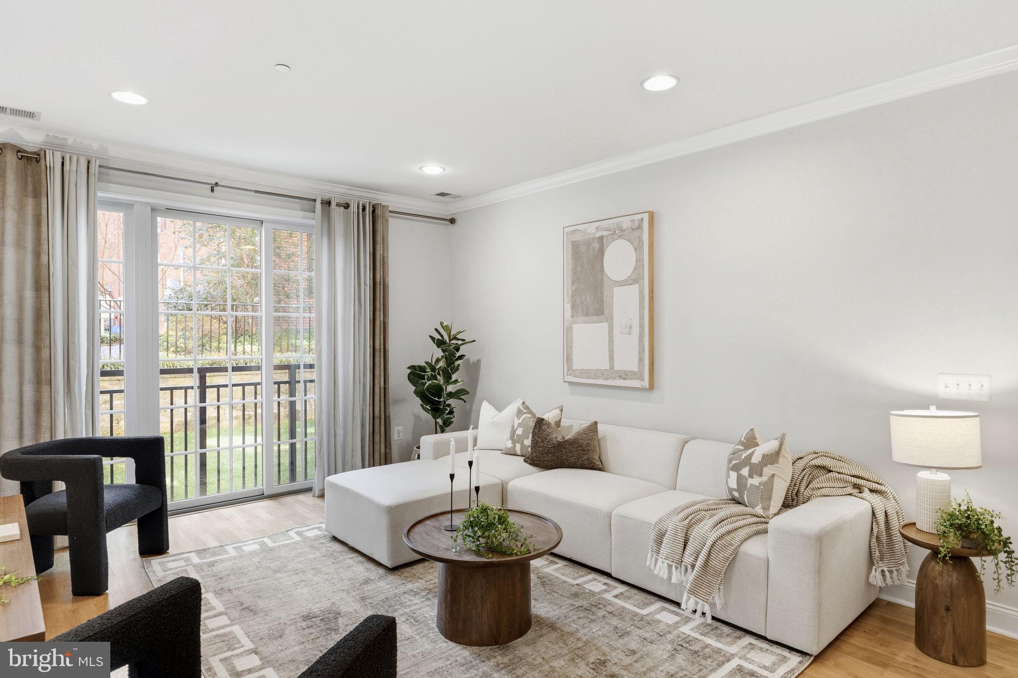 600 Commodore Court, Unit 2604 Philadelphia, PA 19146 - Photo 9 of 33 a living room with furniture and a large window