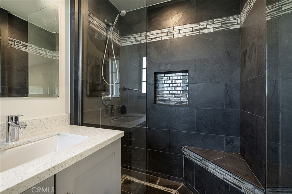 2206 Stinson Street Simi Valley, CA 93065 - Photo 16 of 22 a bathroom with a sink a toilet and shower