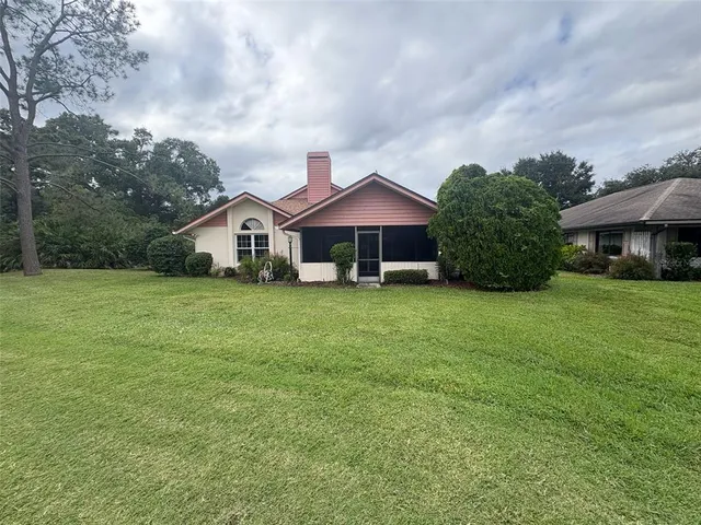 a view of a golf course with a lake
