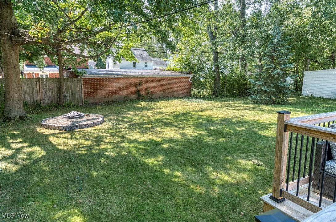 4520 Birchwold Road Cleveland, OH 44121 - Photo 40 of 40 View of backyard with a fire pit