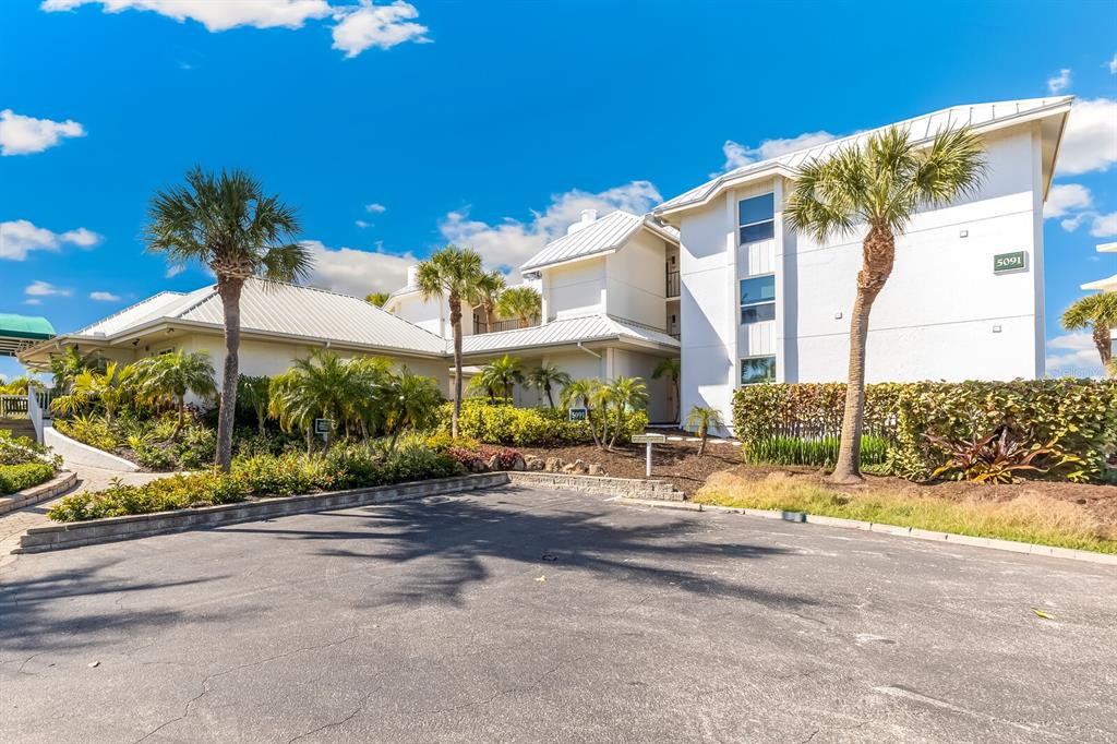 5000 Gasparilla Road, Unit DC107 Boca Grande, FL 33921 - Photo 2 of 30 a view of a house with a patio