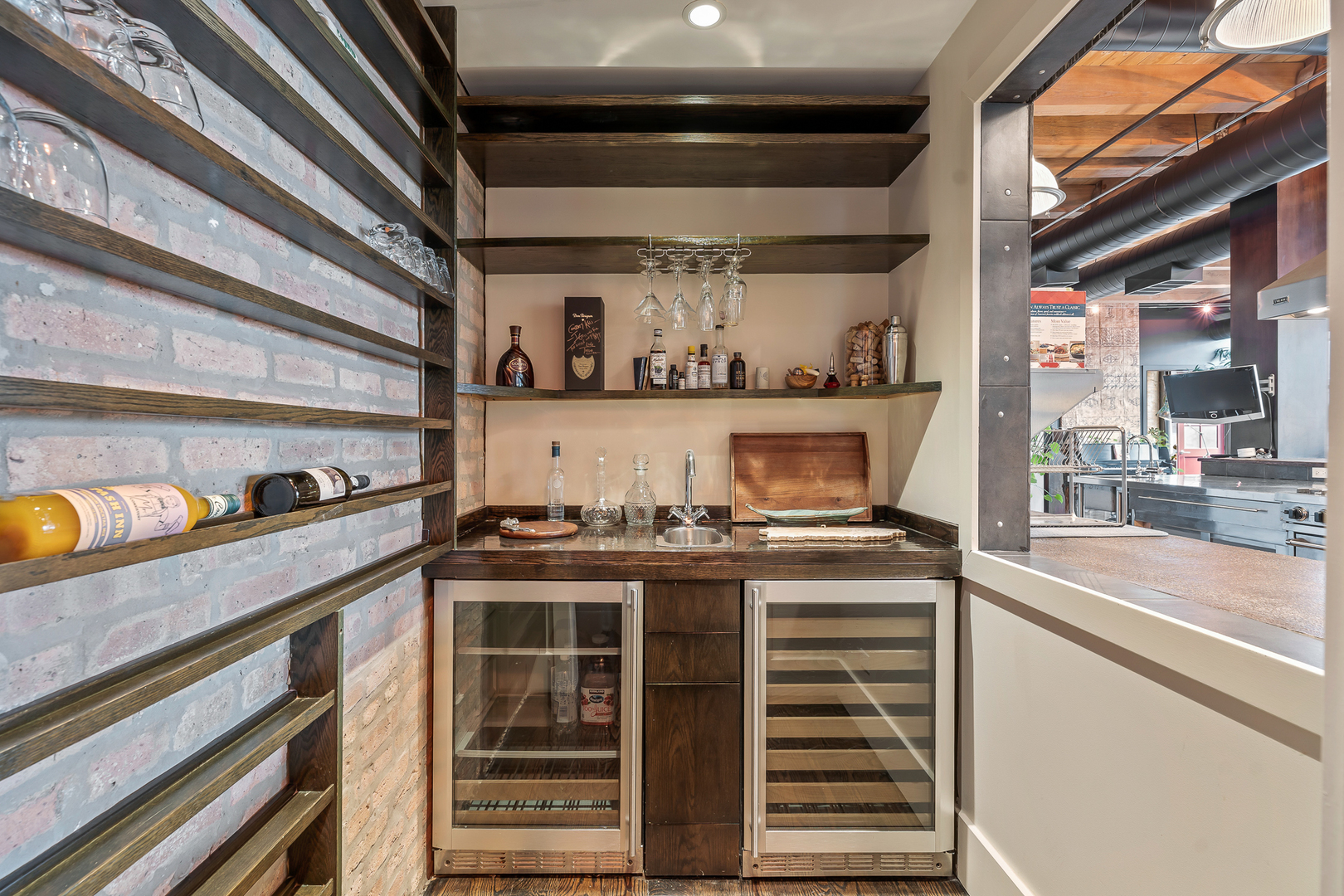 1101 West Lake Street, Unit 5E Chicago, IL 60607 - Photo 21 of 38 a kitchen with a stove and a sink