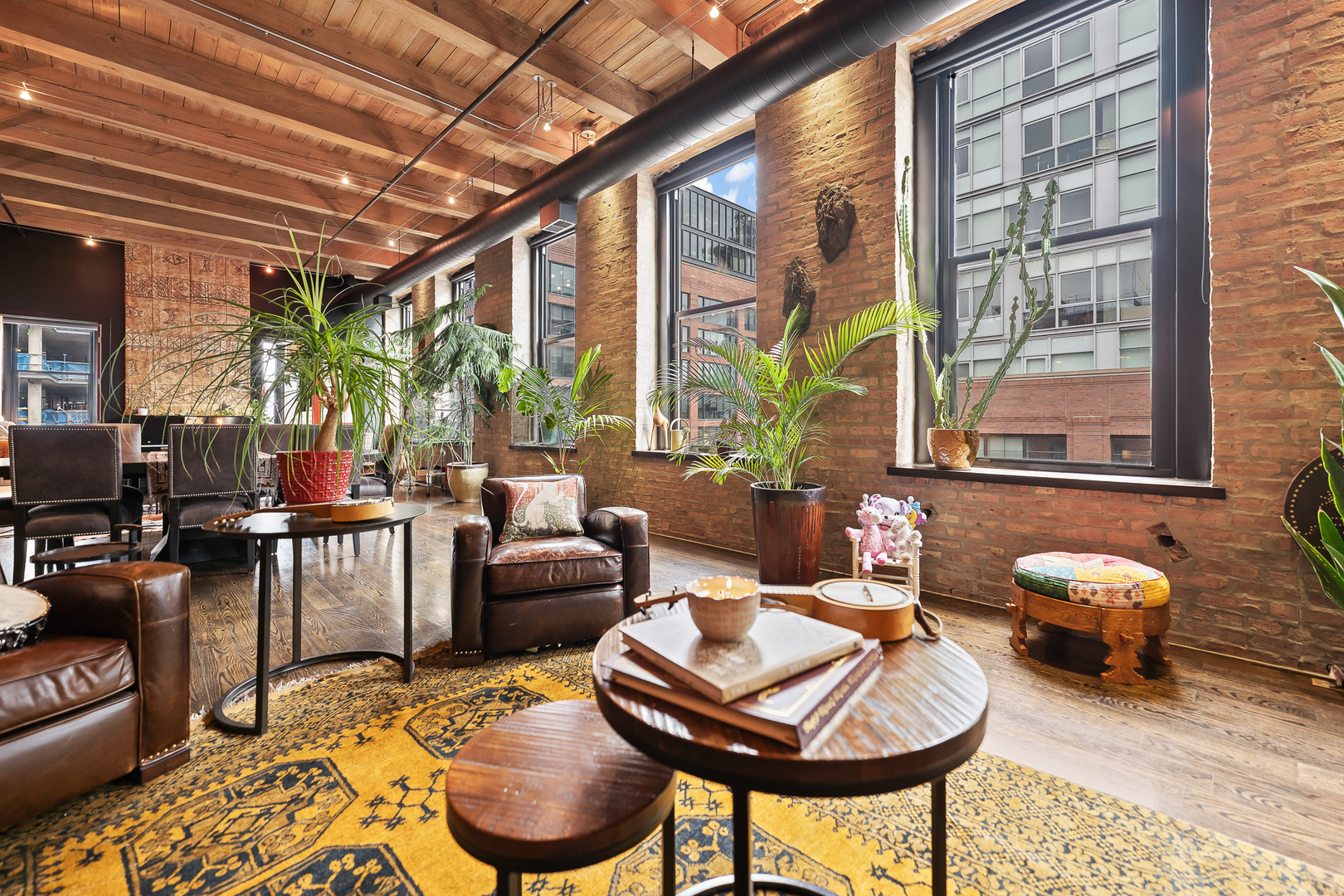 1101 West Lake Street, Unit 5E Chicago, IL 60607 - Photo 8 of 38 a living room with furniture and a floor to ceiling window
