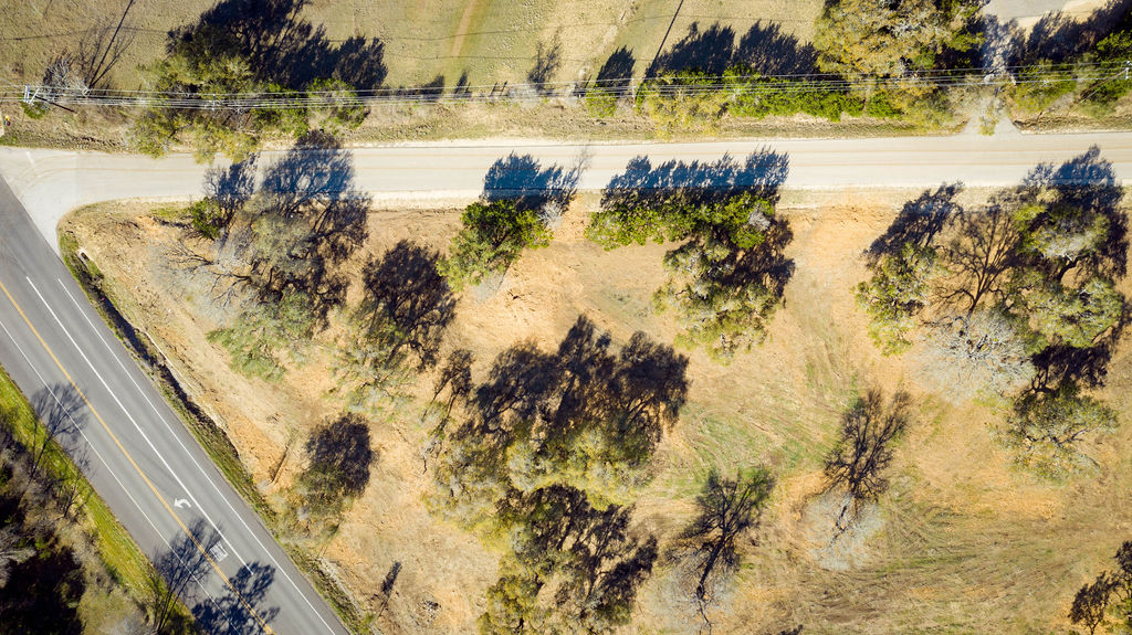 268 Kinnikinik Loop Austin, TX 78737 - Photo 7 of 23 a view of a large body of water with a building in the background