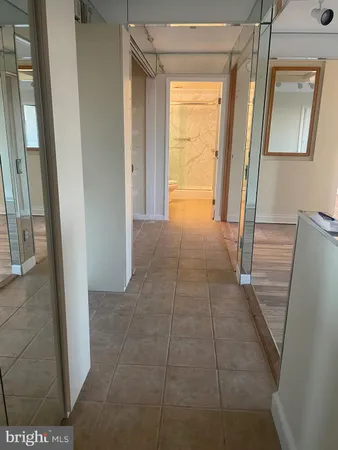 a view of hallway with shower