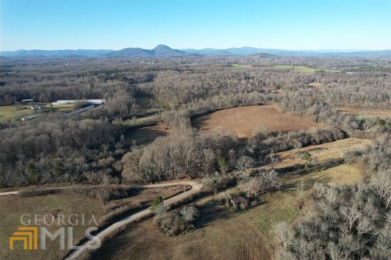 784 Webb West Road, Unit 4 Cleveland, GA 30528 - Photo 1 of 1 an aerial view of mountain with trees