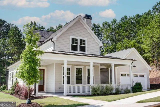 front view of a house and a yard