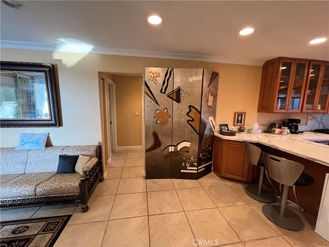 a bathroom with a sink a toilet and a window