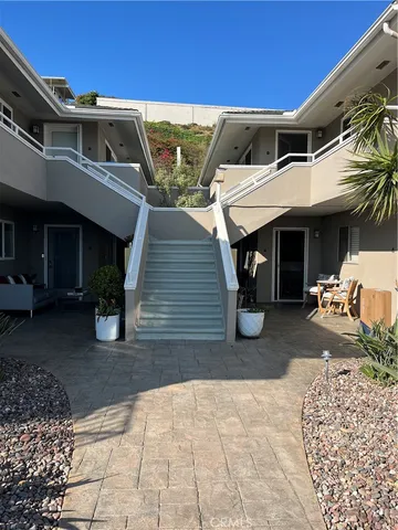a large kitchen with lots of appliances and furniture