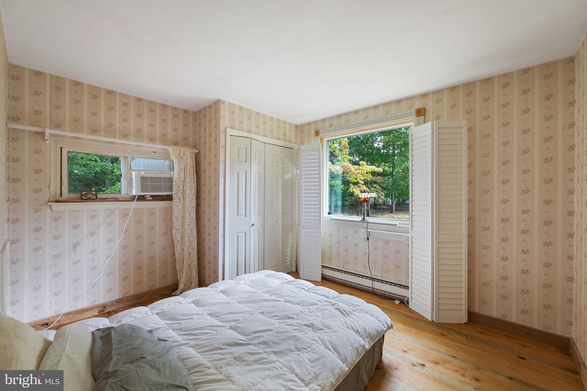 601 Cathcart Road Blue Bell, PA 19422 - Photo 15 of 38 a bedroom with a bed and a window