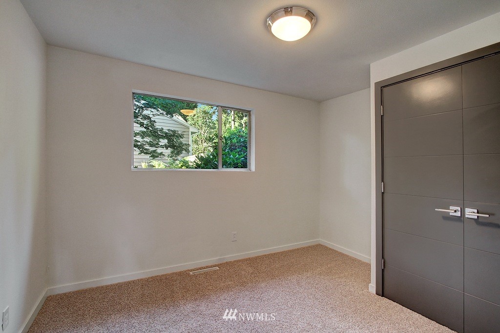 24320 4th Place West Bothell, WA 98021 - Photo 8 of 24 an empty room with a window