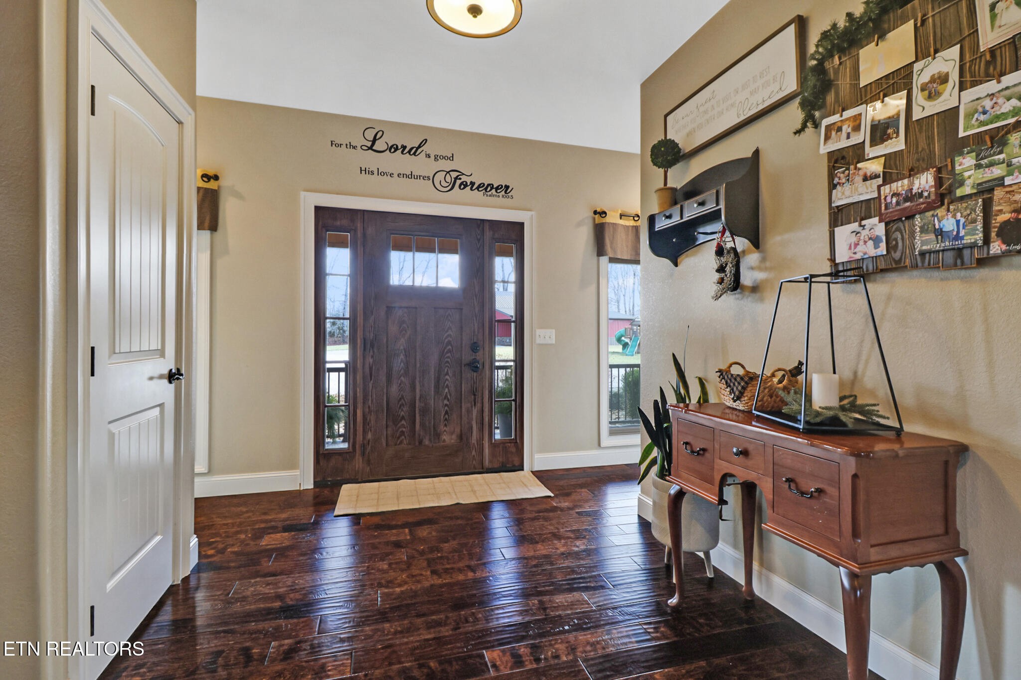 370 Randolph Road Crossville, TN 38571 - Photo 11 of 60 a view of a hallway with wooden floor and stairs