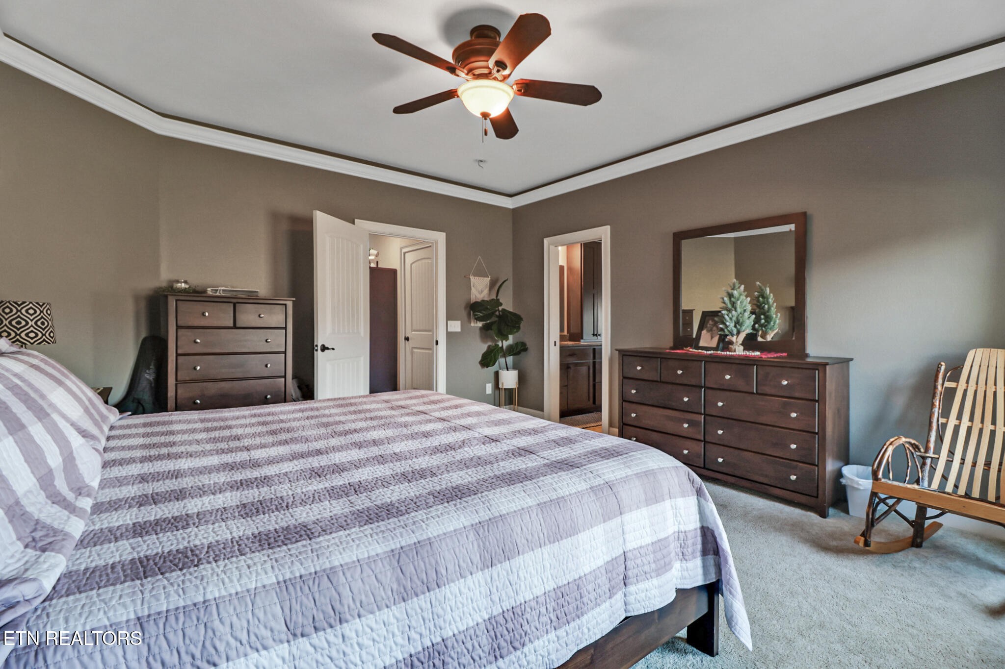 370 Randolph Road Crossville, TN 38571 - Photo 24 of 60 a bedroom with a bed and a dresser