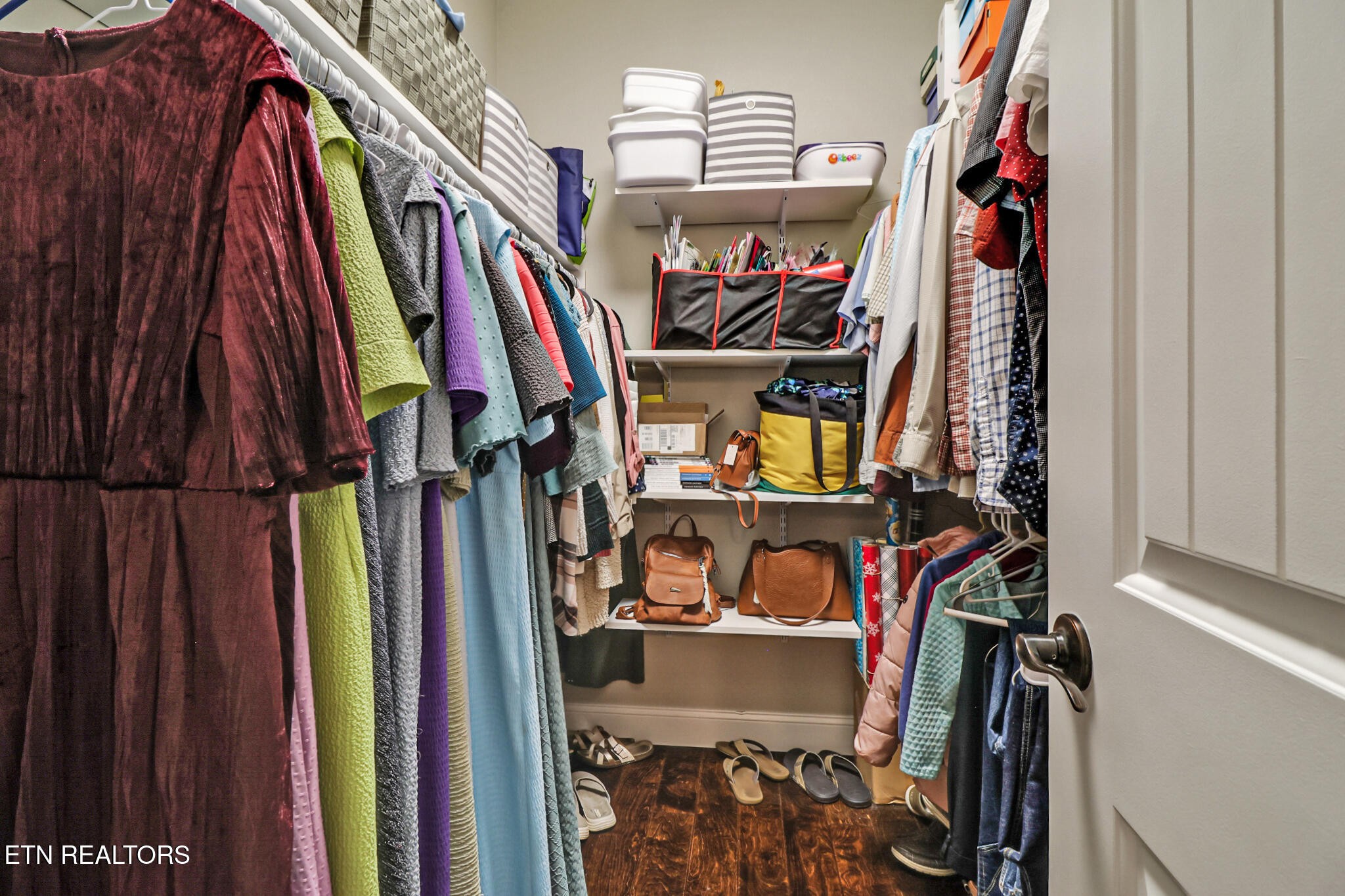 370 Randolph Road Crossville, TN 38571 - Photo 29 of 60 a view of walk in closet with clothes and shoes