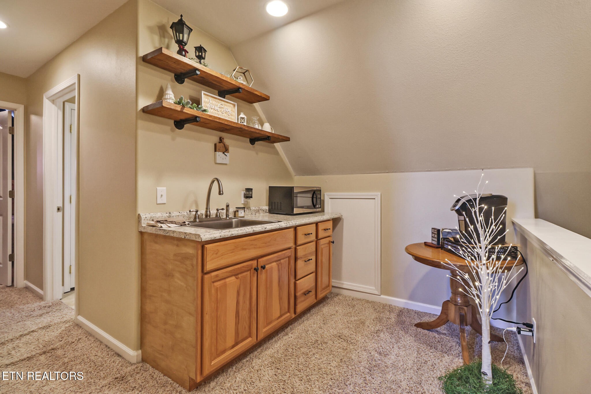 370 Randolph Road Crossville, TN 38571 - Photo 40 of 60 a kitchen with a sink a stove and a refrigerator
