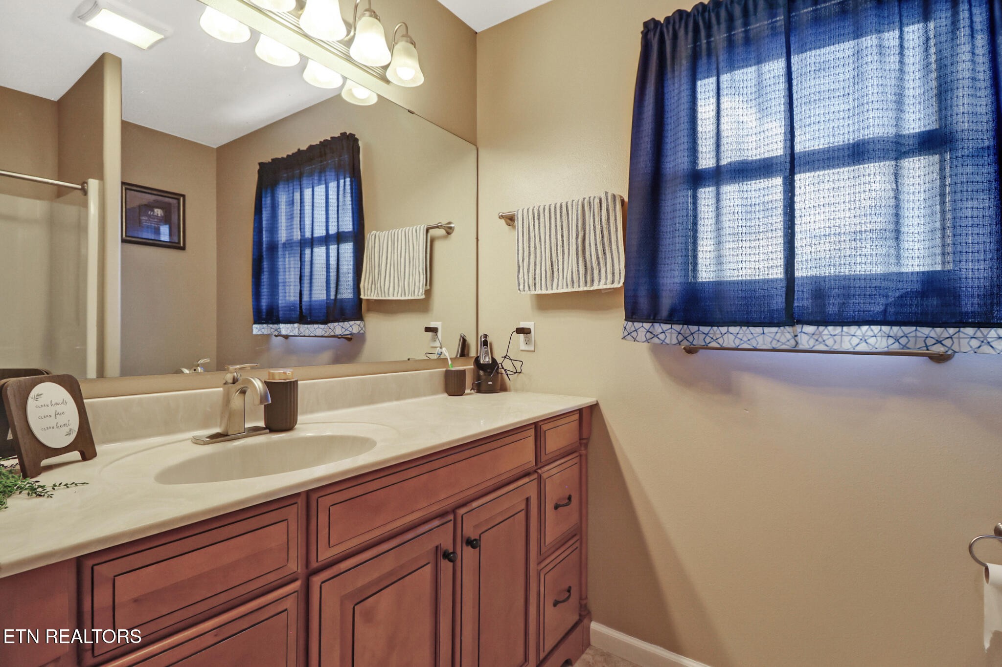 370 Randolph Road Crossville, TN 38571 - Photo 43 of 60 a bathroom with a sink double vanity and a mirror