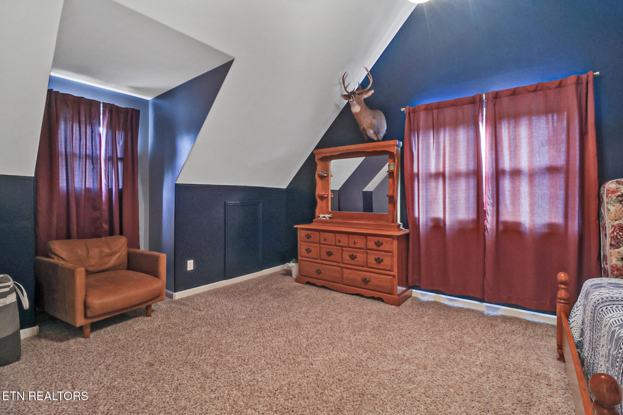 370 Randolph Road Crossville, TN 38571 - Photo 45 of 60 a room with furniture and a dresser