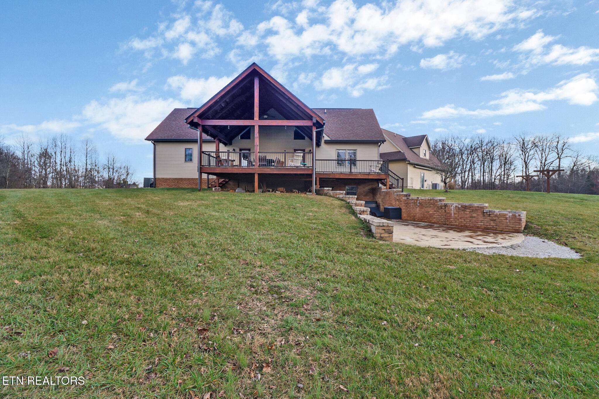 370 Randolph Road Crossville, TN 38571 - Photo 6 of 60 a view of a house with a yard balcony and sitting area
