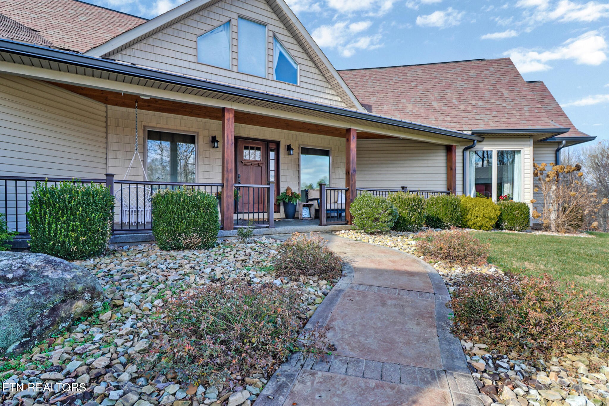 370 Randolph Road Crossville, TN 38571 - Photo 8 of 60 a front view of a house with garden