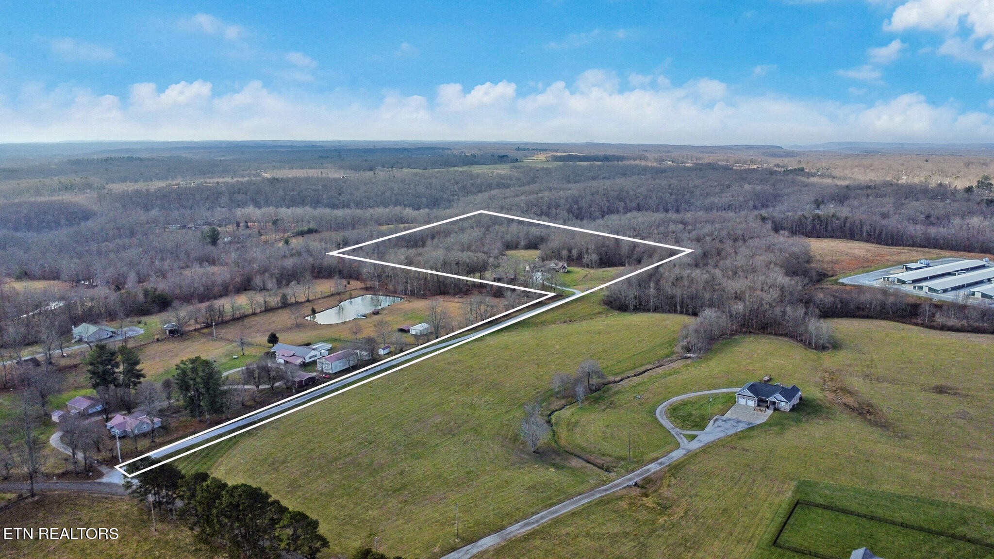 370 Randolph Road Crossville, TN 38571 - Photo 10 of 60 an aerial view of a house