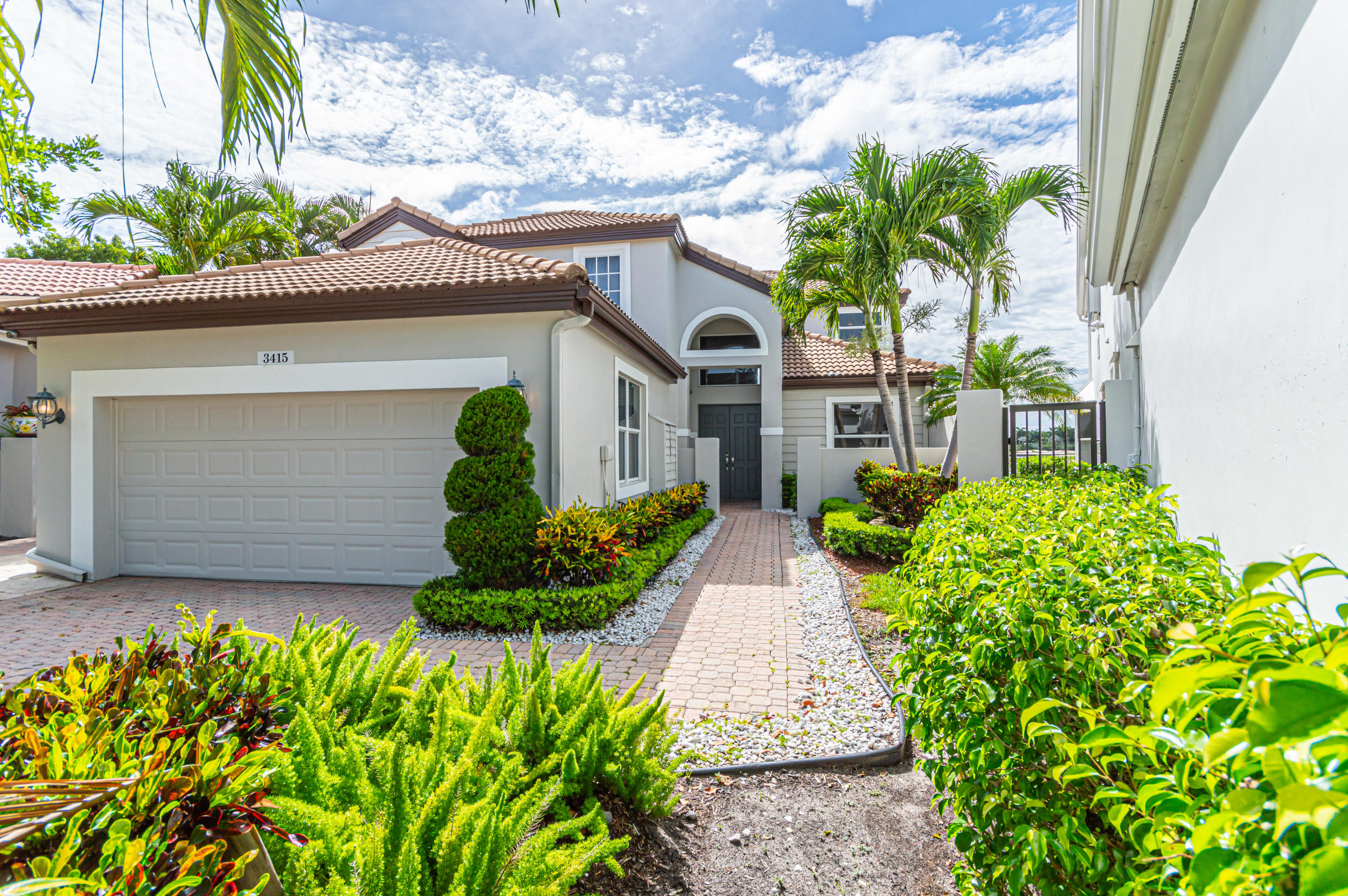 3415 Northwest 51st Place Boca Raton, FL 33496 - Photo 2 of 38 Front View