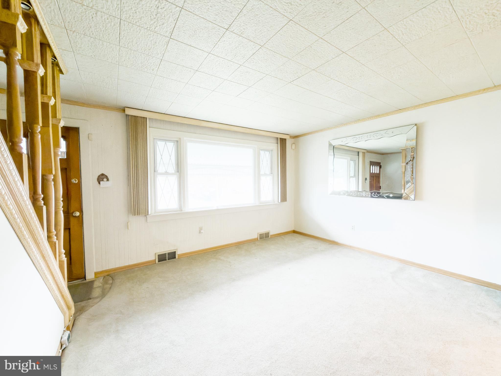 440 Durham Road Langhorne, PA 19047 - Photo 13 of 23 an empty room with a empty space and windows