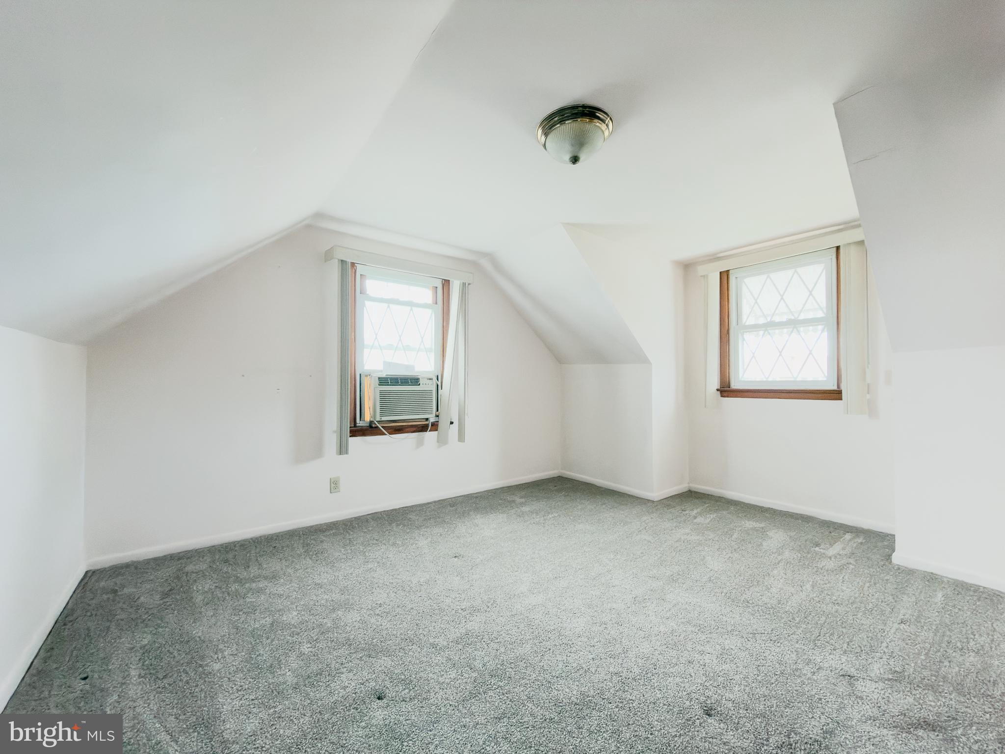 440 Durham Road Langhorne, PA 19047 - Photo 20 of 23 an empty room with a empty space and windows